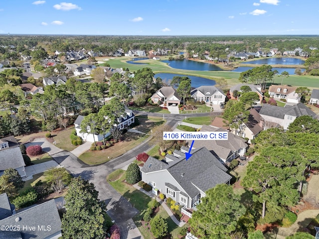 4106 Kittiwake Ct, Southport, NC 28461 - aerial view of property and surrounding area featuring nearby suburban area, a golf club, and a large body of water