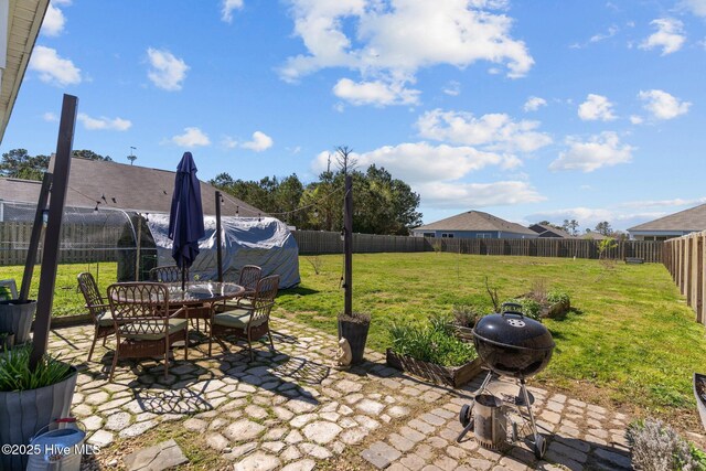 exterior space featuring a fenced backyard