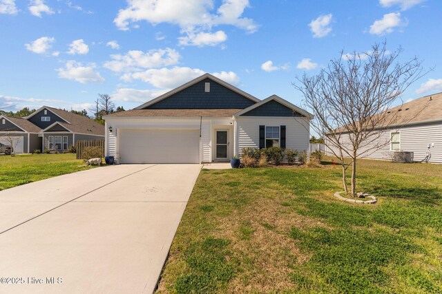 view of front facade featuring a garage, concrete driveway, a front lawn, and central AC