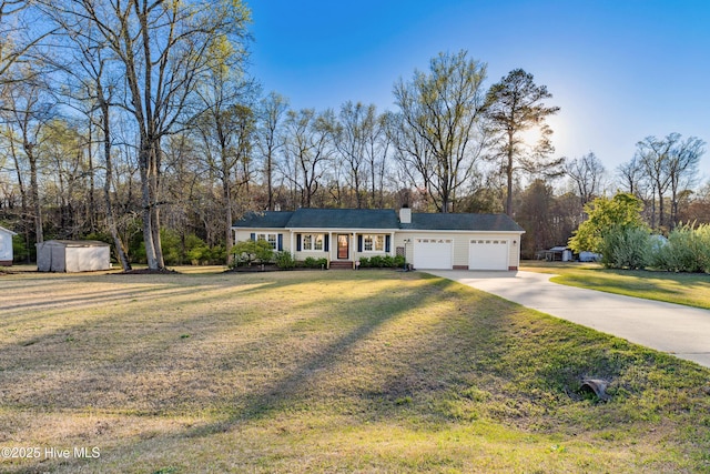 ranch-style home featuring driveway, a chimney, an outdoor structure, a front lawn, and a garage