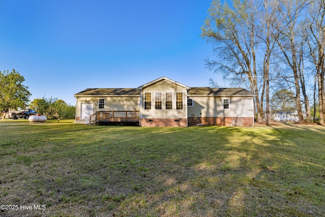 back of house with a yard, crawl space, and a deck