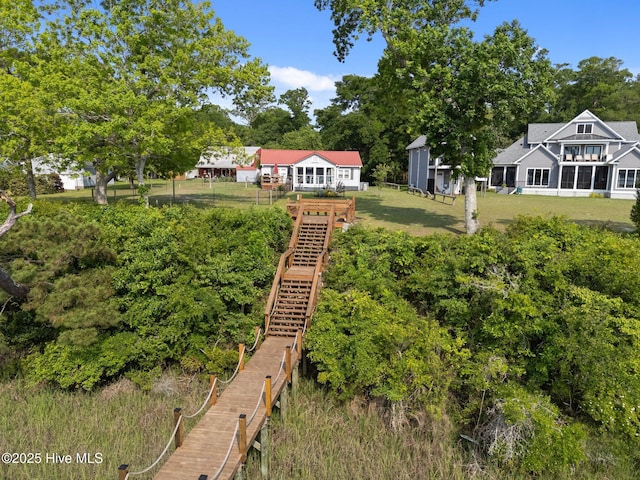 3582 Norman Dr SW, Supply, NC 28462 - view of yard with stairway and view of scattered trees