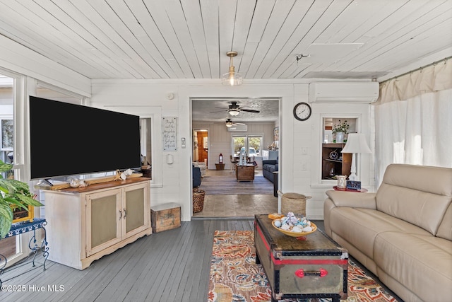 3582 Norman Dr SW, Supply, NC 28462 - living room with an AC wall unit, a ceiling fan, hardwood / wood-style flooring, and wood ceiling