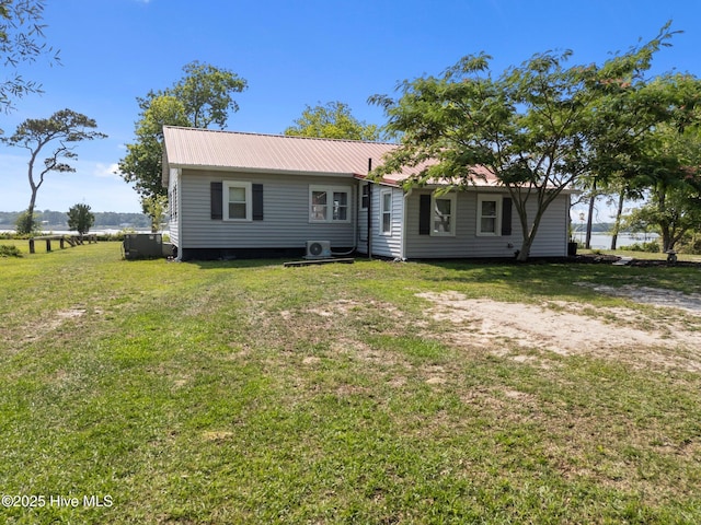 3582 Norman Dr SW, Supply, NC 28462 - view of front facade with metal roof and a front yard
