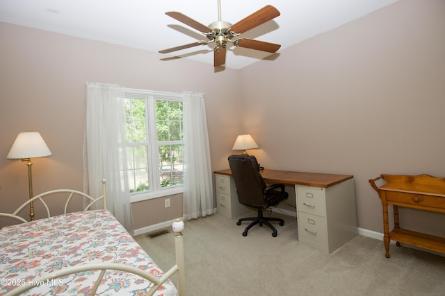 bedroom featuring light carpet, visible vents, baseboards, and a ceiling fan