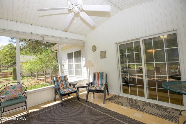 sunroom / solarium with ceiling fan