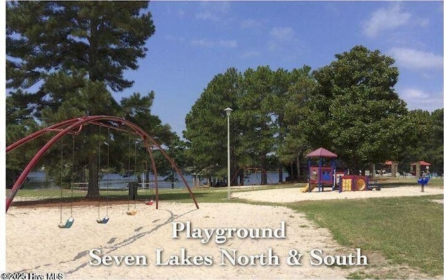 community playground with a lawn