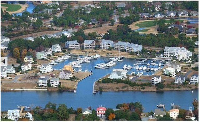 bird's eye view of a large body of water and a marina