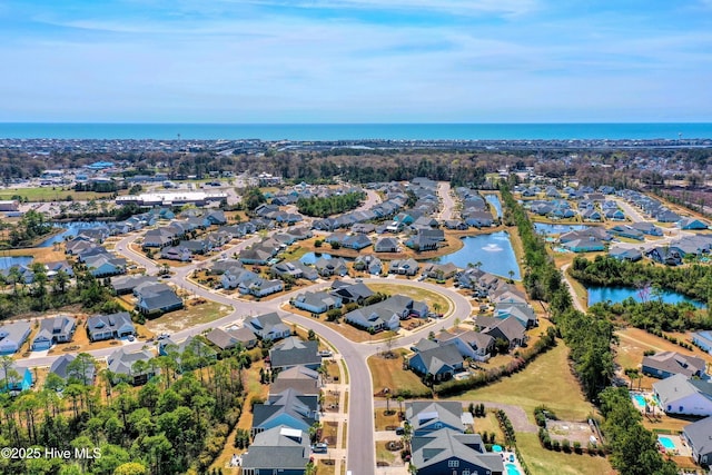 1381 Ellsworth Dr SW, Ocean Isle Beach, NC 28469 - aerial view of property's location with a large body of water and nearby suburban area