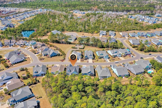 1381 Ellsworth Dr SW, Ocean Isle Beach, NC 28469 - aerial view of property and surrounding area featuring nearby suburban area