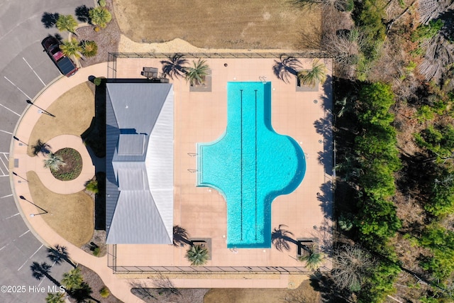 1381 Ellsworth Dr SW, Ocean Isle Beach, NC 28469 - aerial view of property and surrounding area featuring a pool area