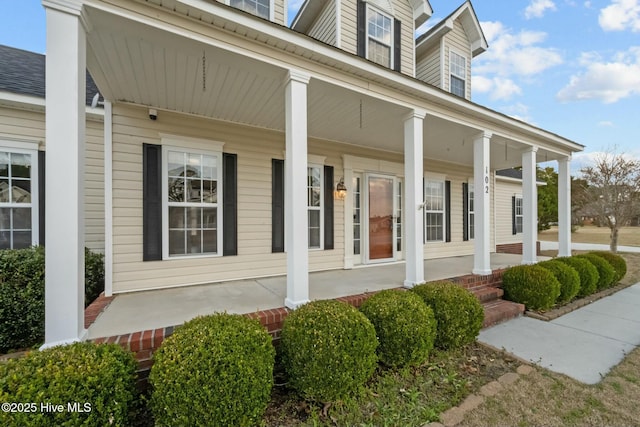 property entrance with a porch
