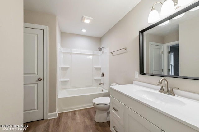 208 Elm St, Whiteville, NC 28472 - bathroom featuring wood finished floors, toilet, shower / bathing tub combination, and vanity