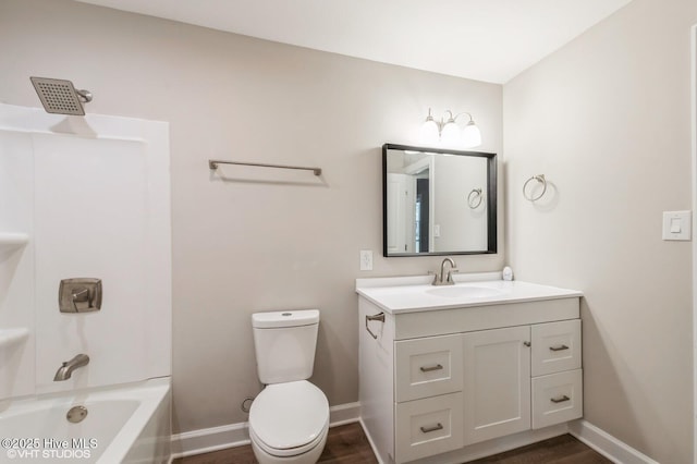 208 Elm St, Whiteville, NC 28472 - bathroom with toilet, vanity,  shower combination, and baseboards