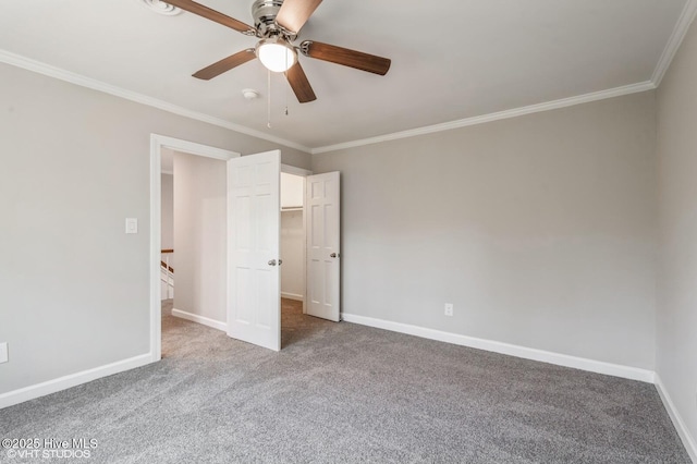 208 Elm St, Whiteville, NC 28472 - unfurnished bedroom with baseboards, crown molding, and carpet flooring