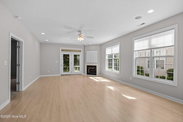 512 Village Green Dr Unit A, Morehead City, NC 28557 - unfurnished living room with baseboards, a ceiling fan, light wood-style flooring, and recessed lighting