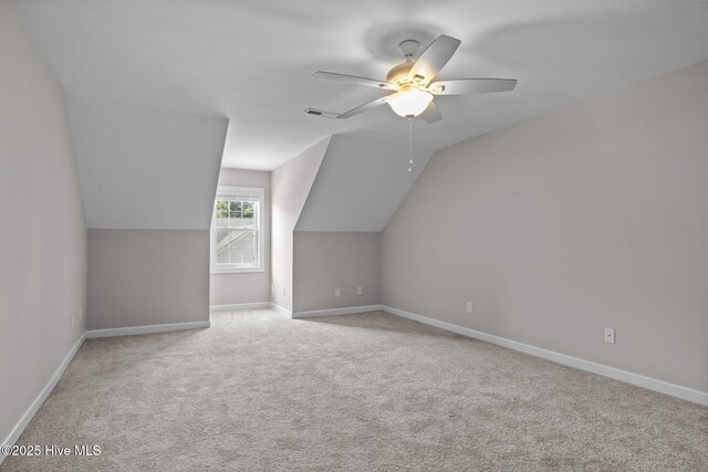 512 Village Green Dr Unit A, Morehead City, NC 28557 - additional living space featuring a ceiling fan, carpet floors, lofted ceiling, and baseboards