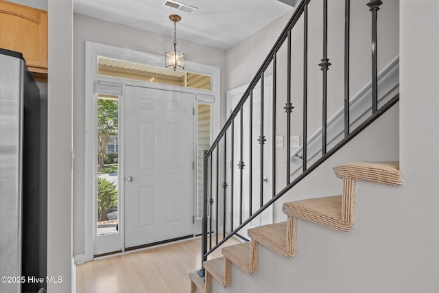 512 Village Green Dr Unit A, Morehead City, NC 28557 - entryway featuring light wood-style flooring and stairs