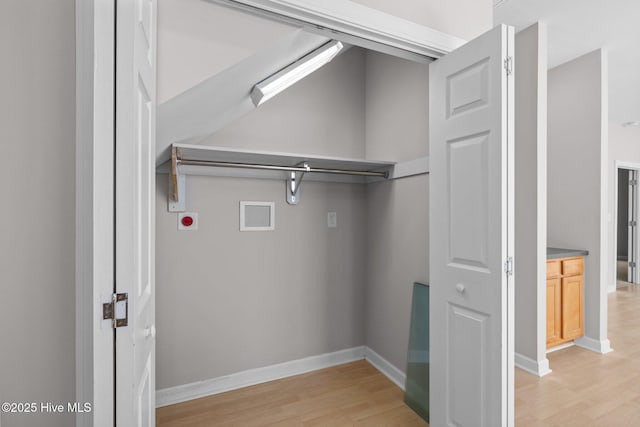 512 Village Green Dr Unit A, Morehead City, NC 28557 - washroom featuring washer hookup, light wood-type flooring, and baseboards