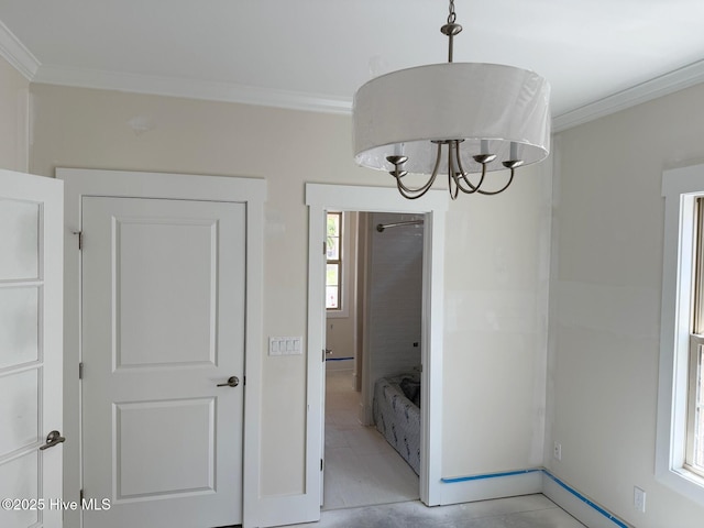 457 Motts Forest Rd Unit 69, Wilmington, NC 28412 - unfurnished dining area with ornamental molding, a chandelier, and light tile patterned flooring