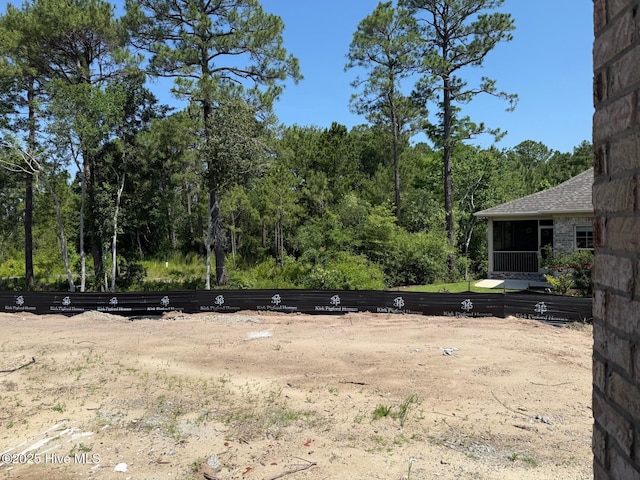 457 Motts Forest Rd Unit 69, Wilmington, NC 28412 - view of yard featuring a sunroom
