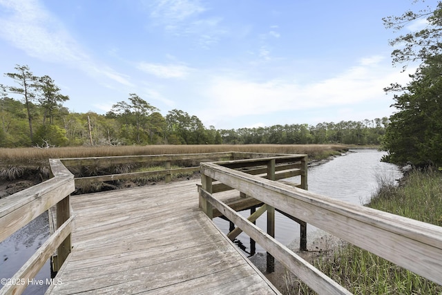 view of dock with a water view