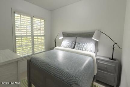 bedroom with multiple windows