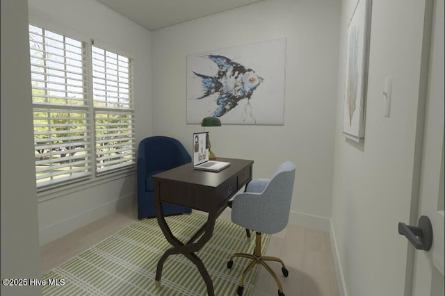 home office with wood finished floors and baseboards