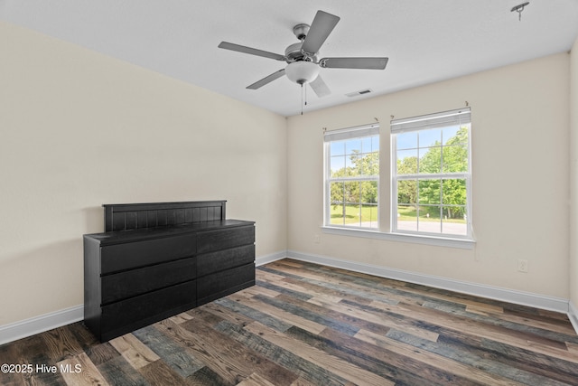 141 Trevor Way, Moyock, NC 27958 - unfurnished bedroom with visible vents, wood finished floors, and baseboards