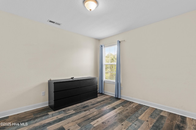 141 Trevor Way, Moyock, NC 27958 - empty room with baseboards, visible vents, and wood finished floors
