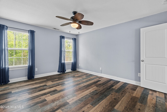 141 Trevor Way, Moyock, NC 27958 - spare room with ceiling fan, baseboards, dark wood-type flooring, and visible vents