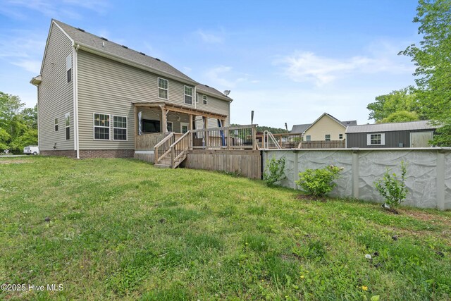 141 Trevor Way, Moyock, NC 27958 - back of property with a yard, a wooden deck, and stairs