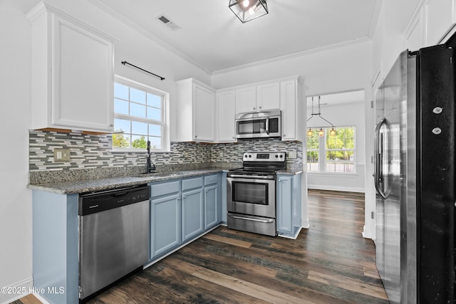 141 Trevor Way, Moyock, NC 27958 - kitchen featuring white cabinets, appliances with stainless steel finishes, dark wood-style floors, and a sink