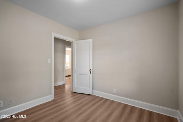502 Thomas Ave, Wilmington, NC 28405 - empty room featuring wood finished floors and baseboards