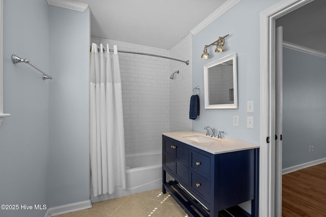 full bathroom featuring tile patterned flooring, vanity, crown molding, baseboards, and shower / tub combo