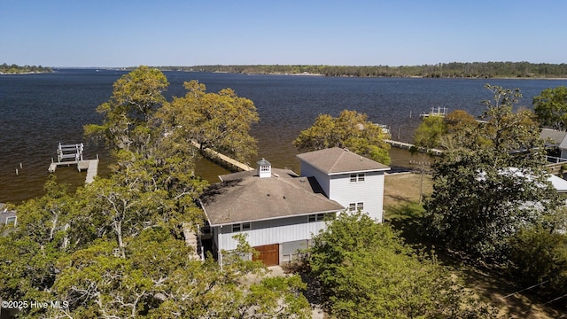 drone / aerial view with a water view