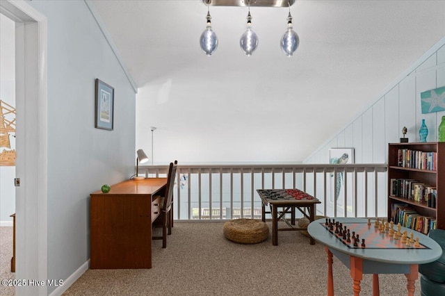 2709 W Beach Dr, Oak Island, NC 28465 - sitting room with carpet, lofted ceiling, and a decorative wall