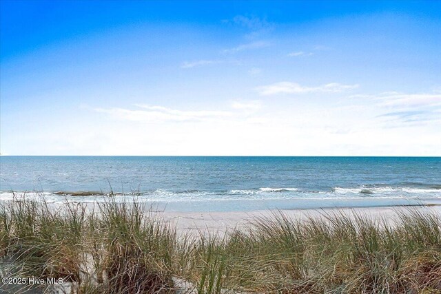 2709 W Beach Dr, Oak Island, NC 28465 - water view with a beach view