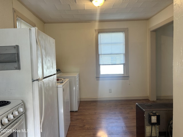 500 Rowan Rd, Clinton, NC 28328 - kitchen featuring washer / clothes dryer, white appliances, wood finished floors, ornamental molding, and baseboards