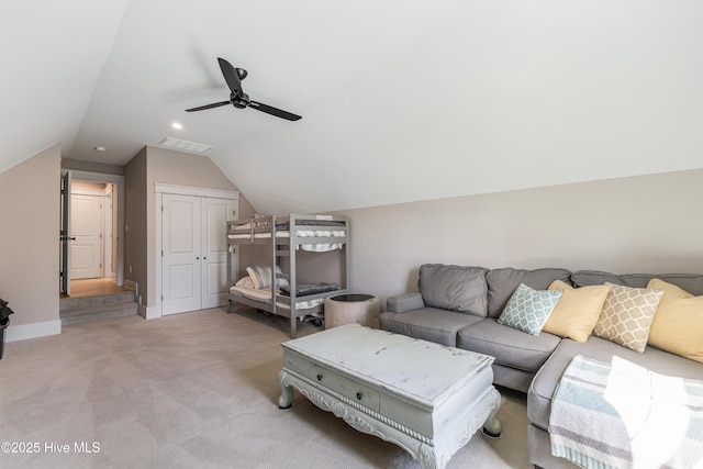 392 Blossom Tree Ln SE, Bolivia, NC 28422 - living room with light carpet, lofted ceiling, ceiling fan, and baseboards