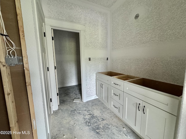 bathroom featuring concrete floors