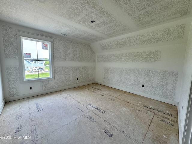 empty room featuring a textured ceiling
