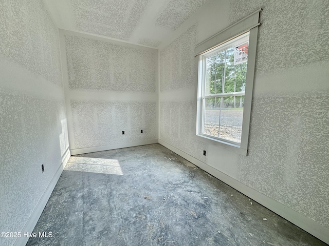 empty room featuring concrete floors