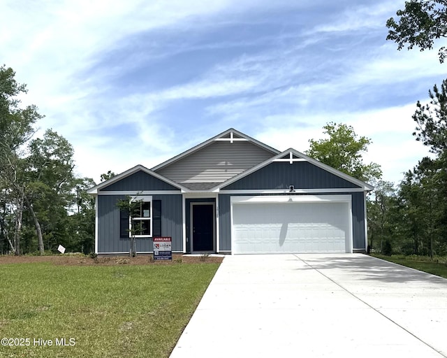 1718 Star Cross Dr SW Unit 149, Shallotte, NC 28470 - ranch-style home featuring a garage, a front yard, and driveway