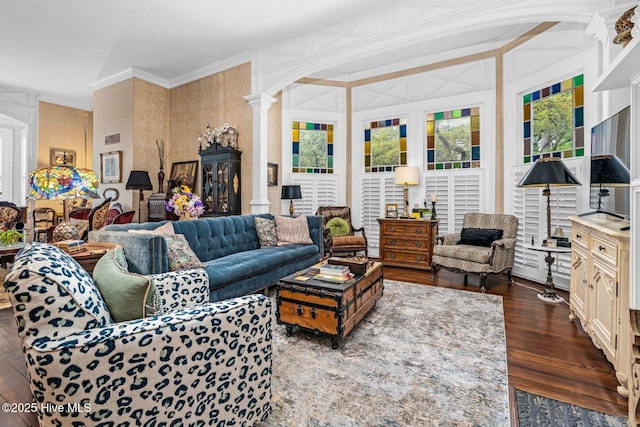 311 E Church St, Tarboro, NC 27886 - living room with decorative columns, arched walkways, dark wood-type flooring, and crown molding