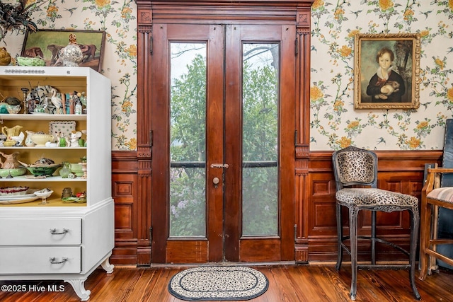 311 E Church St, Tarboro, NC 27886 - doorway with wallpapered walls and wood finished floors