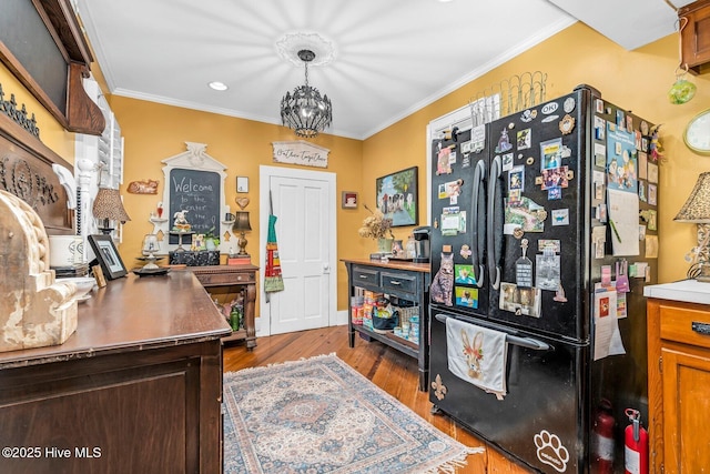311 E Church St, Tarboro, NC 27886 - office space featuring an inviting chandelier, crown molding, and wood finished floors
