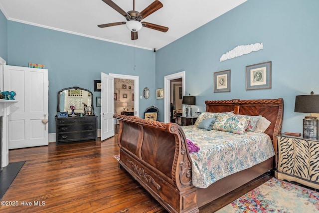 311 E Church St, Tarboro, NC 27886 - bedroom with a towering ceiling, ceiling fan, crown molding, and wood finished floors