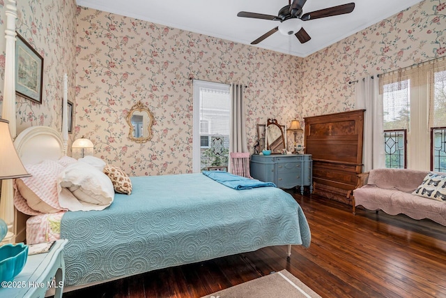 311 E Church St, Tarboro, NC 27886 - bedroom featuring hardwood / wood-style floors, wallpapered walls, and ornamental molding