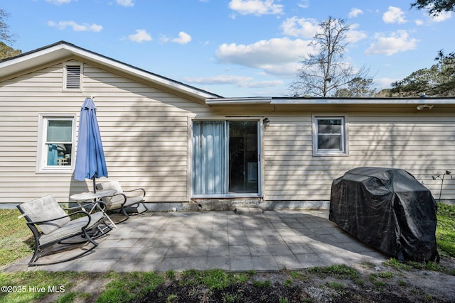 back of house featuring a patio